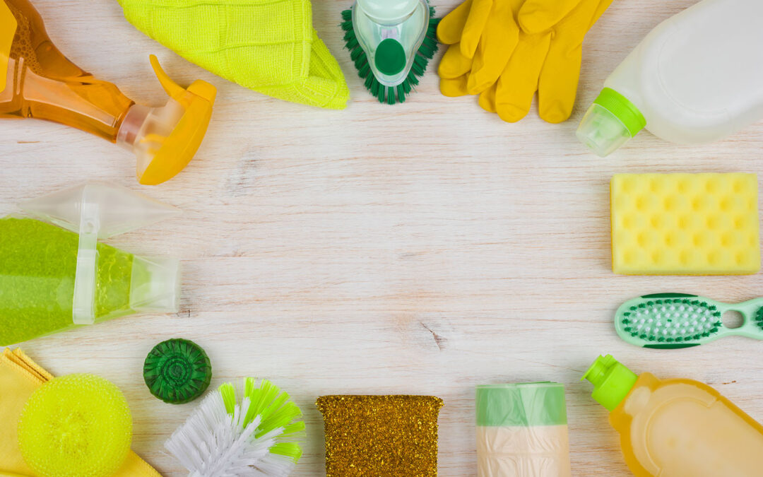 Cleaning and housework concept on wooden background