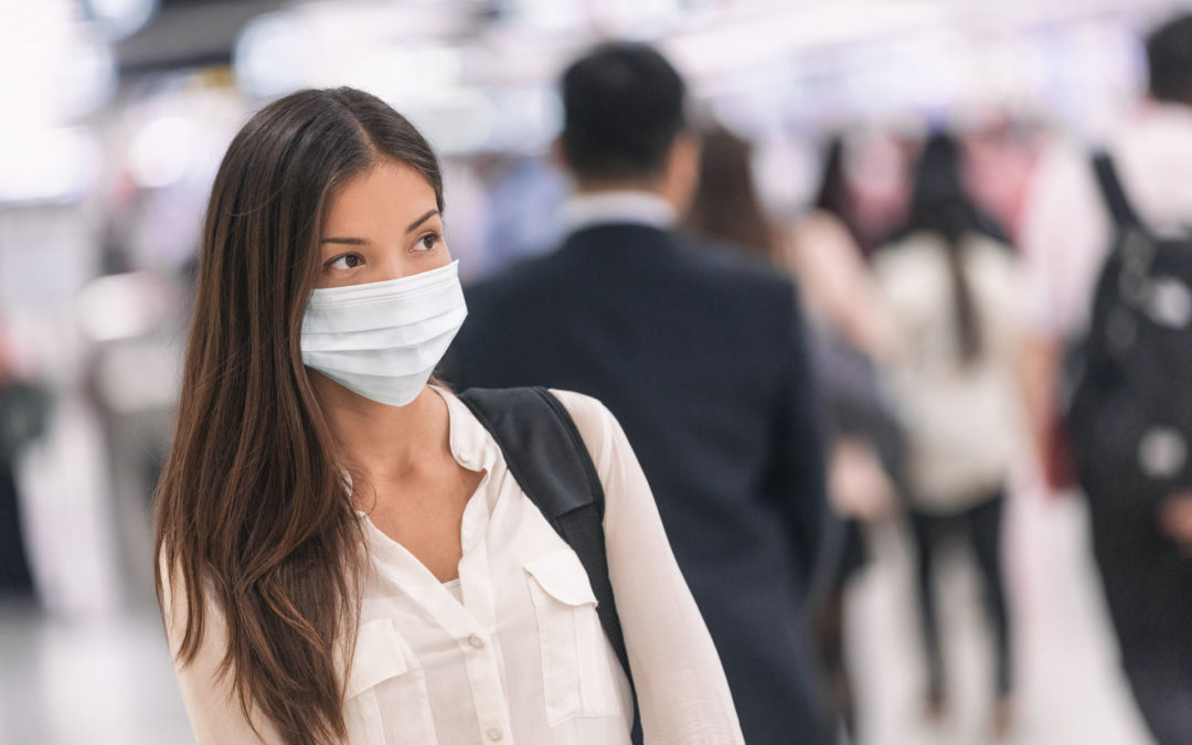 woman with coronavirus wearing medical mask